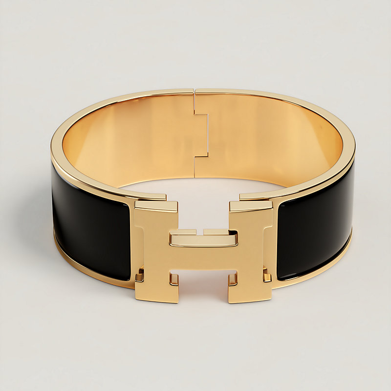 Herm&egrave;s Clic Clac H wide enamel bracelet worn on the wrist