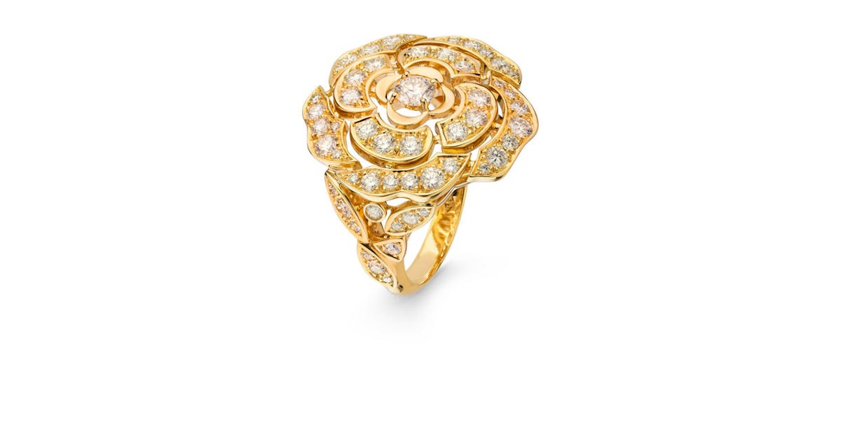 A Bouton de Camélia diamond ring — the pavé bud that sits at the top of the range.