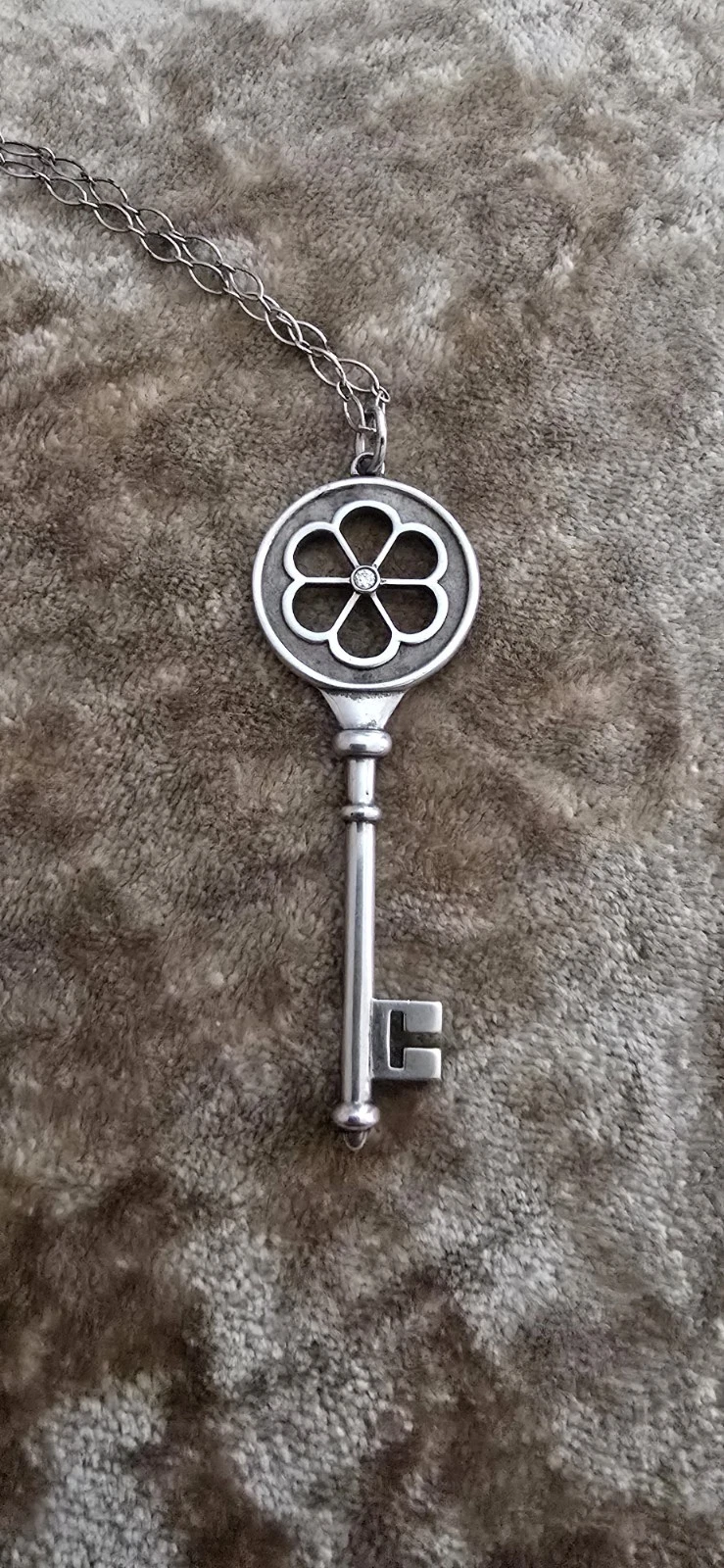 Tiffany daisy flower key pendant set with a diamond
