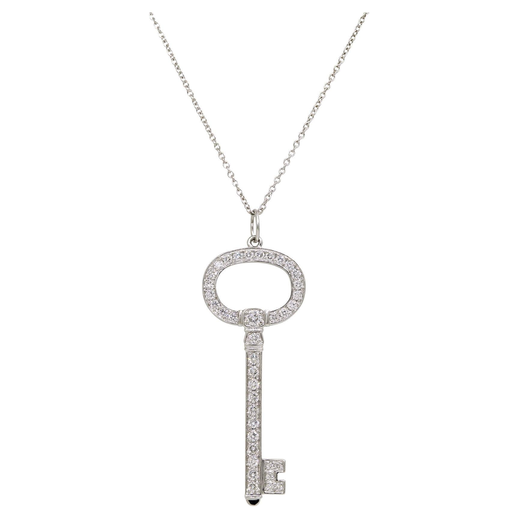 Tiffany oval key pendant in platinum set with natural diamonds