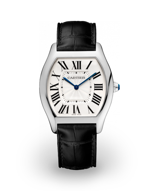 Cartier Tortue in white gold, the slim Extra Flat model, on a lady's dressing table