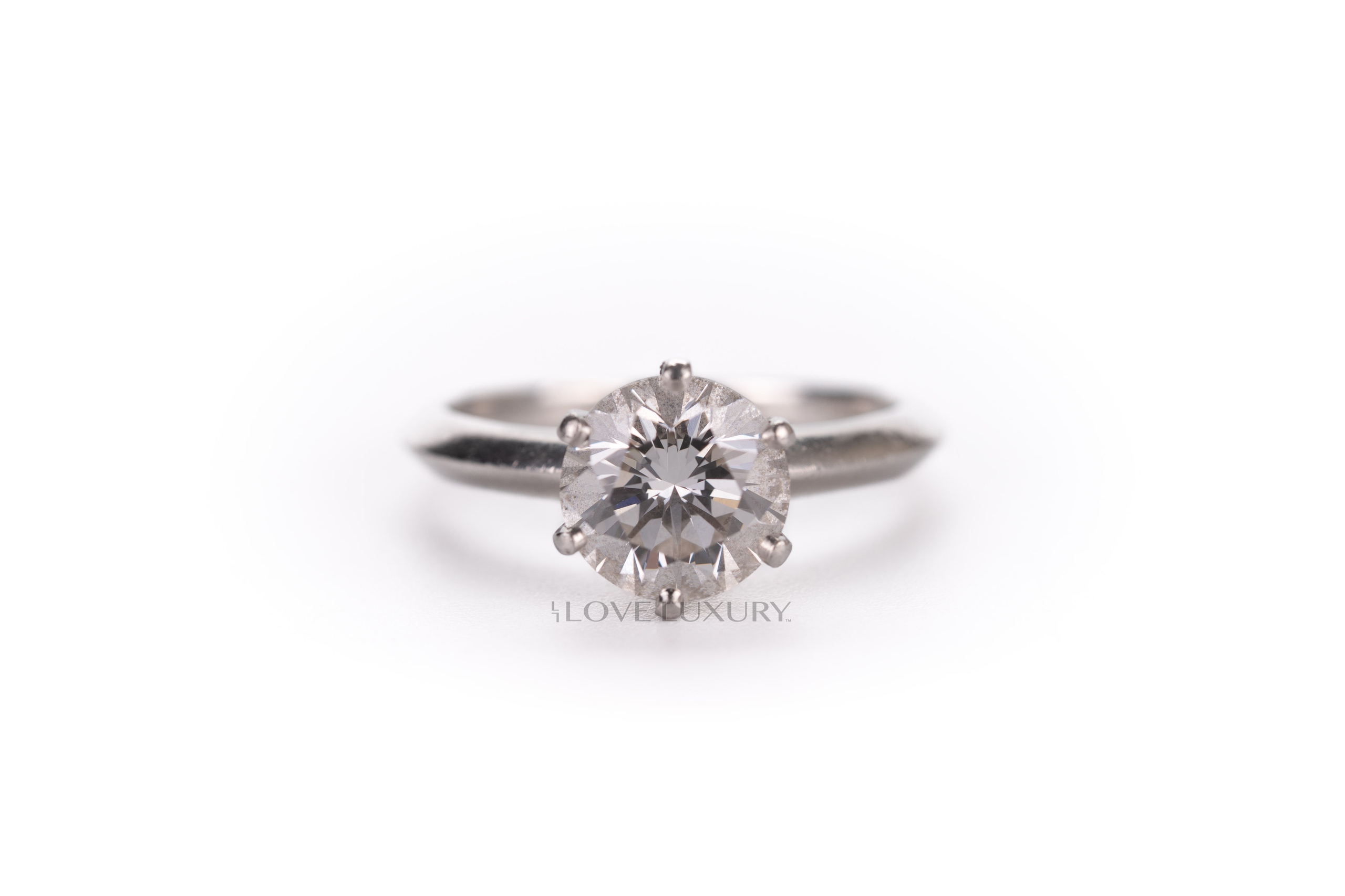 A round-brilliant diamond solitaire ring, in the Tiffany tradition