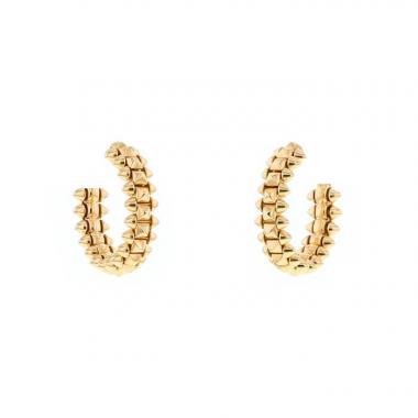 Clash de Cartier hoop earrings in gold, beaded with the collection’s signature studs.