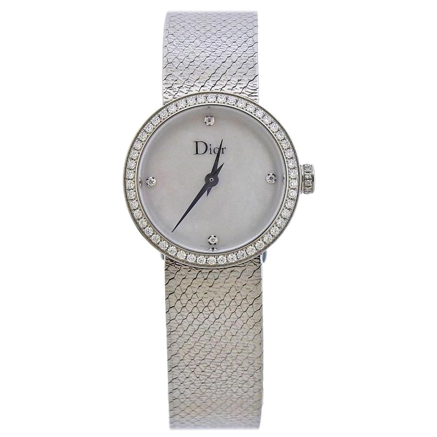 La D de Dior Satine in steel with a mother-of-pearl dial and diamond bezel