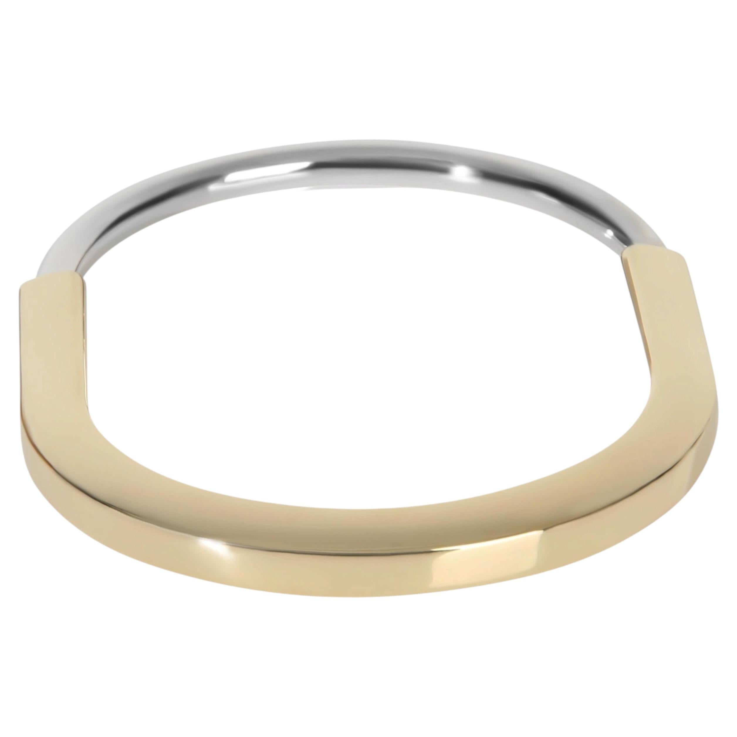 Tiffany Lock two-tone white and yellow gold bangle