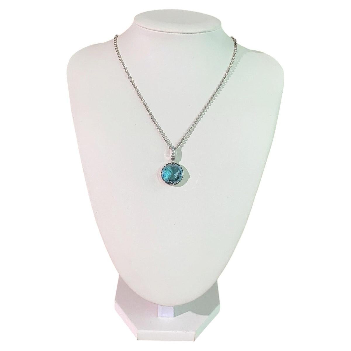 Bulgari Parentesi pendant necklace set with a blue topaz