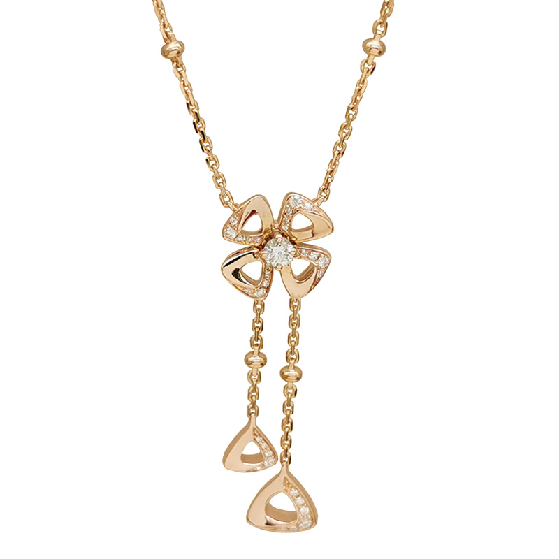 A lady wearing a Bulgari Fiorever rose-gold diamond flower necklace