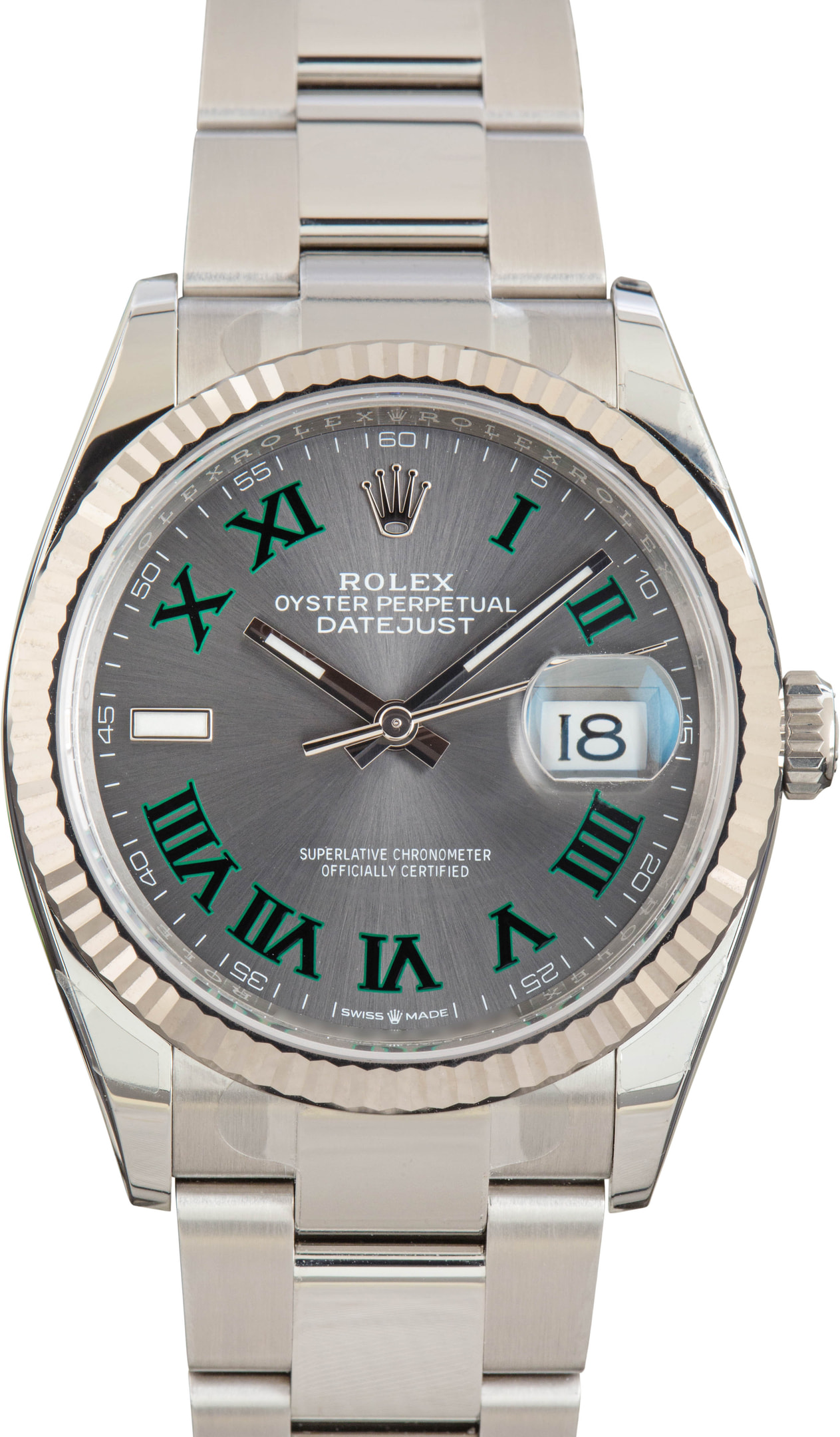 Rolex Datejust 36 with the slate-green Wimbledon dial and white-gold fluted bezel — the most in-demand modern Datejust.